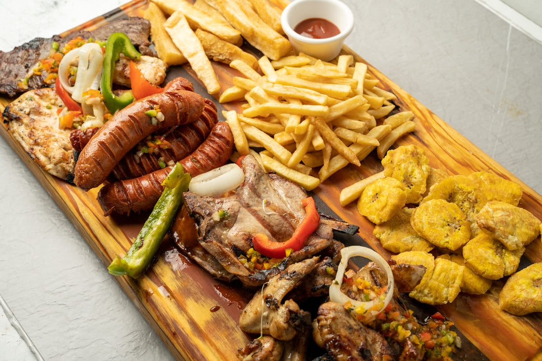 a wooden cutting board topped with lots of food